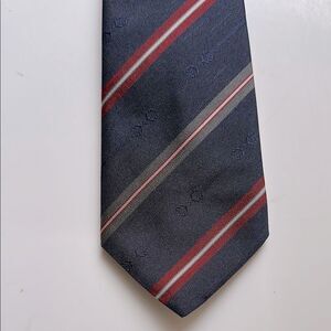 Vintage 60s/70s By Andreu navy blue, red & gray diagonal stripe polyester tie